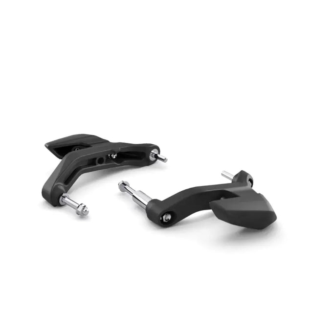 Black motorcycle handlebar grips with metallic silver bolts from originalt triumph rammebeskyttersett for daytona 660