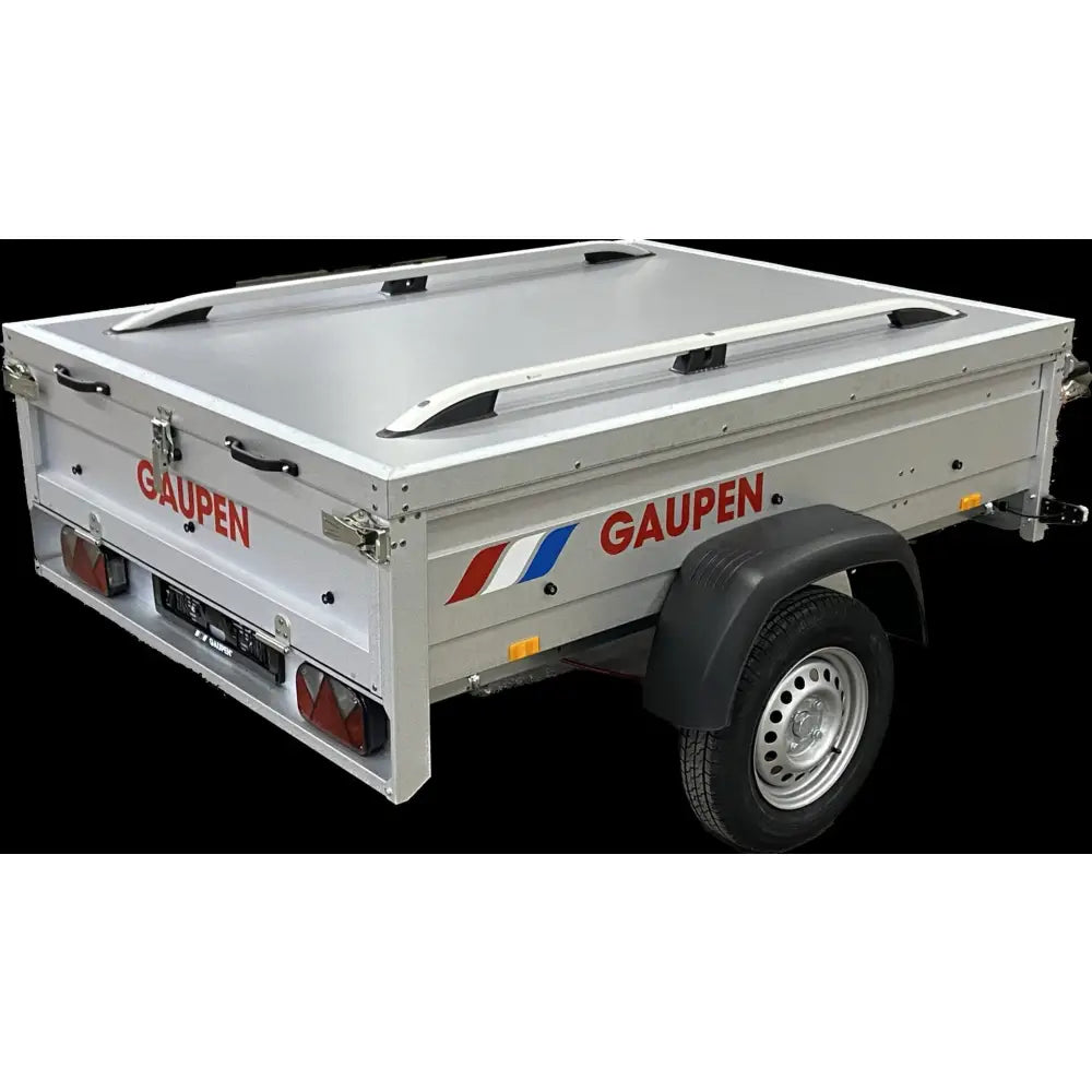 Silver gaupen utility trailer with gaupen flatt lokk rails, red and blue stripes, black rubber fender, metal frame