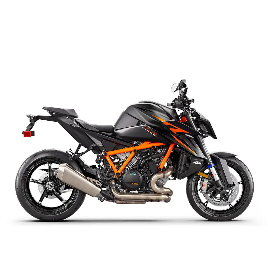 Ktm 1390 super duke r evo 2026 i svart og oransje med aggressivt design og eksponert motor med dual compound-dekk