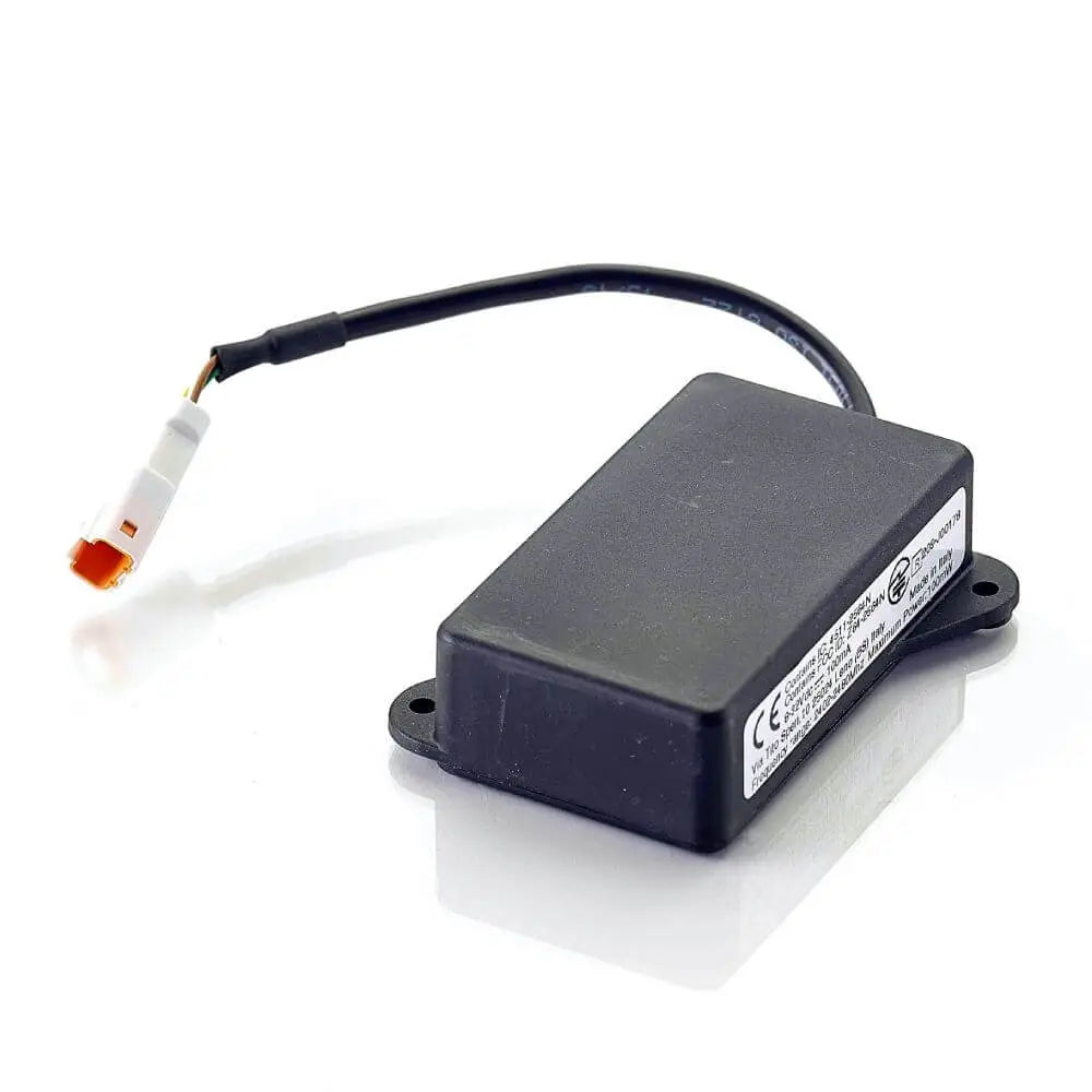 Black rectangular triumph bluetooth connectivity-modul with black cable and white connector with orange tip for speed twin