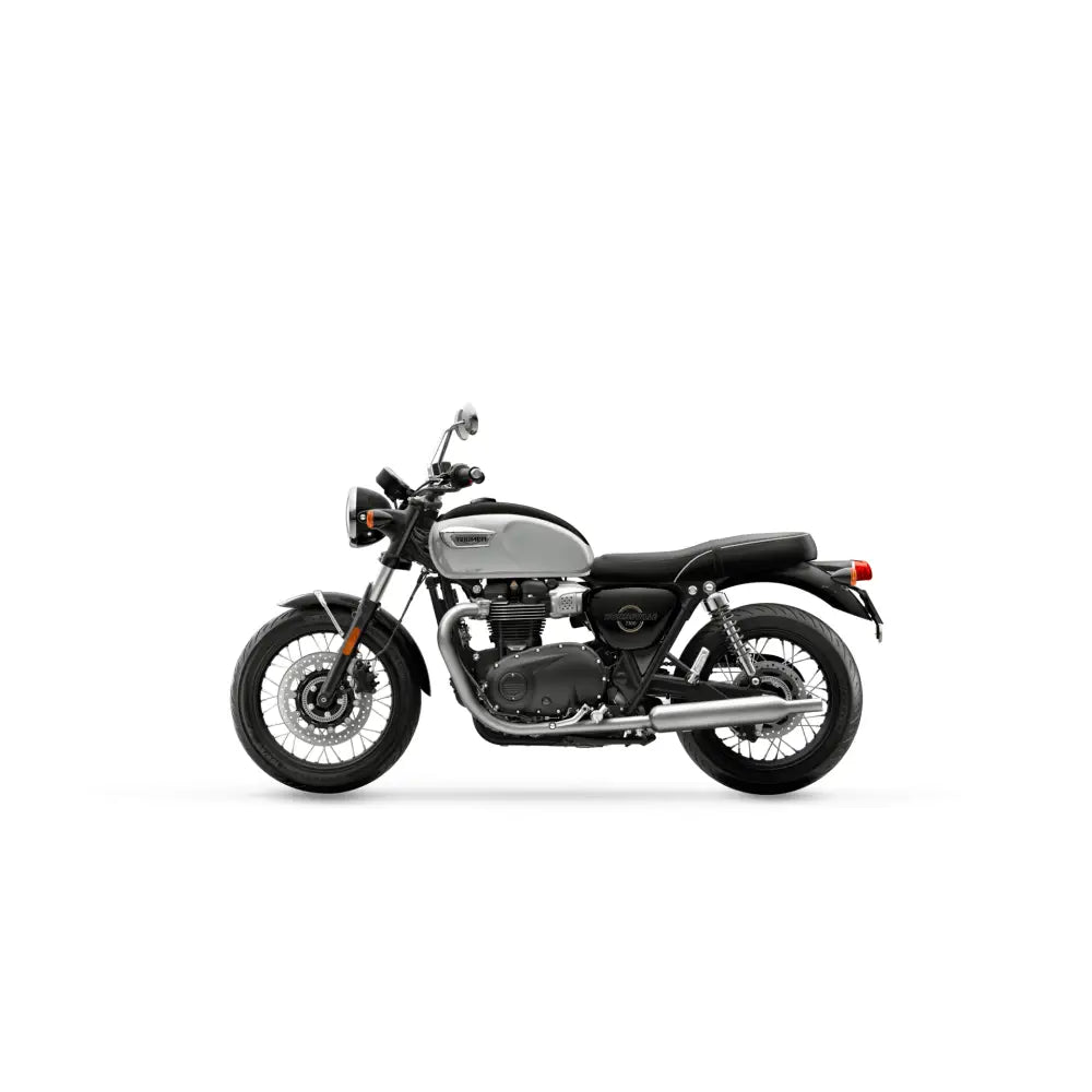 Silver og svart triumph bonneville t100 2026 motorsykkel med chrome detaljer og moderne ytelse i autentiske originalen design