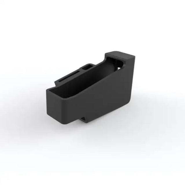 Black plastic magazine holder with precise cutouts for firearm magazines in triumph connectivity monteringssett for speed twin