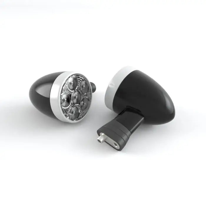 Triumph multifunksjonslys d64 svarte og sølv ovalformede blinklys med moderne led-teknologi og kontroller modell