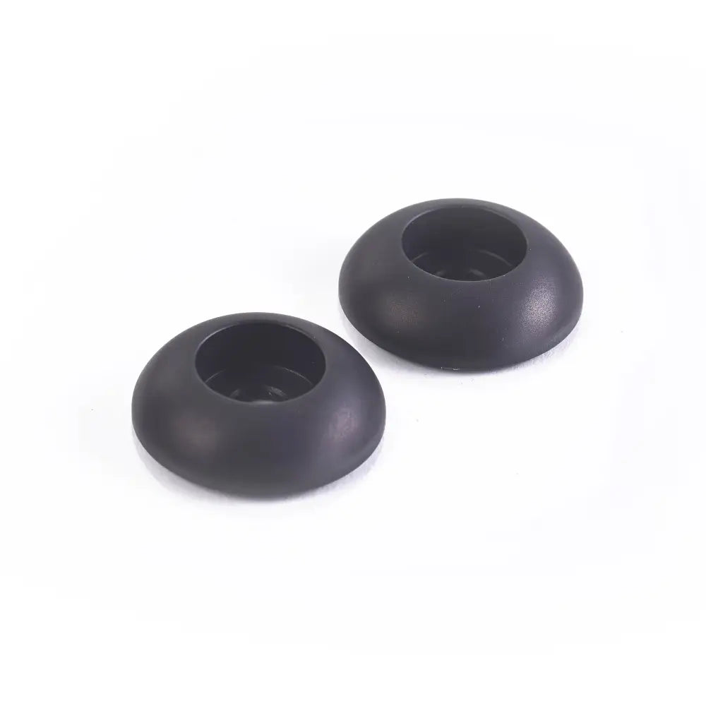 Black rubber earbud tips for triumph rear footrest finisher kit providing durable rear footrest protection