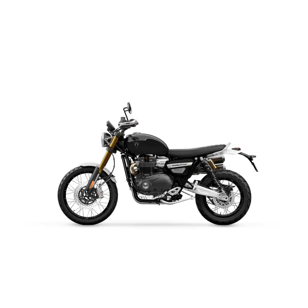 Sort triumph scrambler 1200 xe 2026 med gullfargede forgafler og kromdetaljer i moderne klassiker stil med avansert teknologi