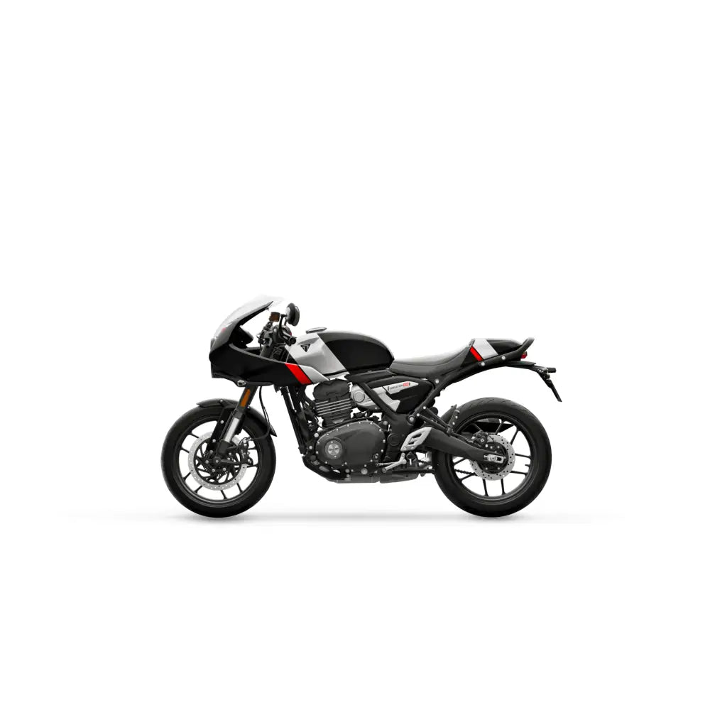 Black and silver triumph thruxton 400 2026 with red accents featuring pirelli diablo rosso tires and klassisk café racer design