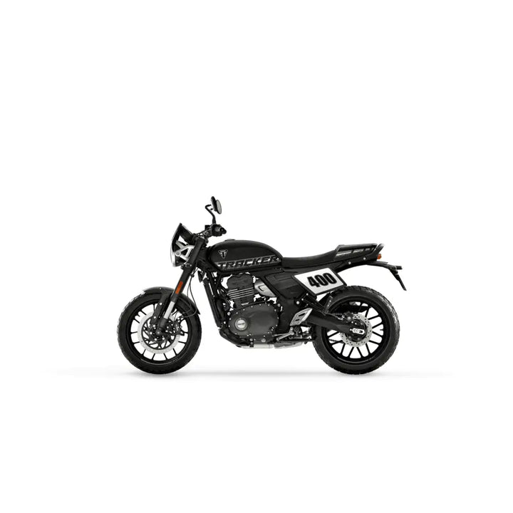 Black triumph tracker 400 2026 with white racing number decals chrome accents and pirelli mt60 tires modern classic motorcycle