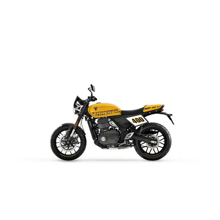 Yellow and black triumph tracker 400 modern classic motorcycle with racing design and pirelli mt60 tires 2026 model